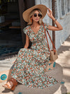 Aurora Blossom: Allover Floral Print Butterfly Sleeve Ruffle Hem Dress