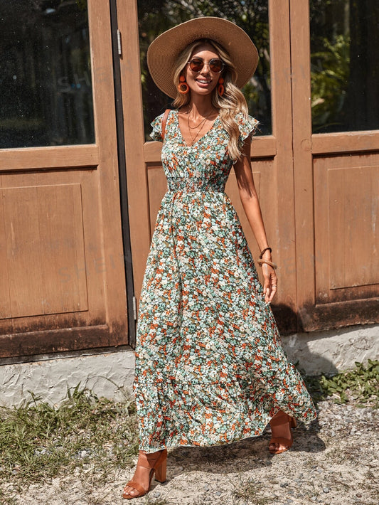 Introducing the Aurora Blossom dress, featuring an allover floral print, delicate butterfly sleeves, and a charming ruffle hem. Made with high-quality materials, this dress is perfect for any occasion and will make you feel elegant and feminine. Embrace the beauty of nature with the Aurora Blossom dress.