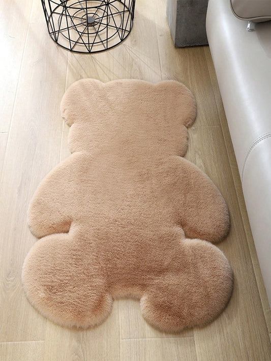 Add a touch of modern coziness to your indoor space with our Furry Friend Brown Bear Shaped Bedroom Rug. Made with high-quality materials, this rug is both stylish and practical, providing comfort and warmth to any room. Embrace the playful charm of this bear-shaped rug and elevate your home decor.