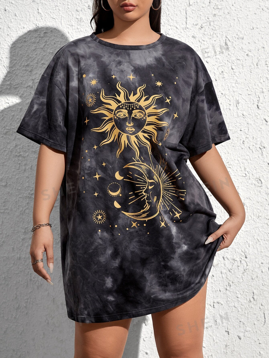 Add some magic to your wardrobe with our Sun & Moon tie-dye dress from our plus size collection. Made with high-quality fabric and expertly crafted, this dress offers both style and comfort for all body types. Stand out in unique and vibrant tie-dye patterns while embracing your curves.