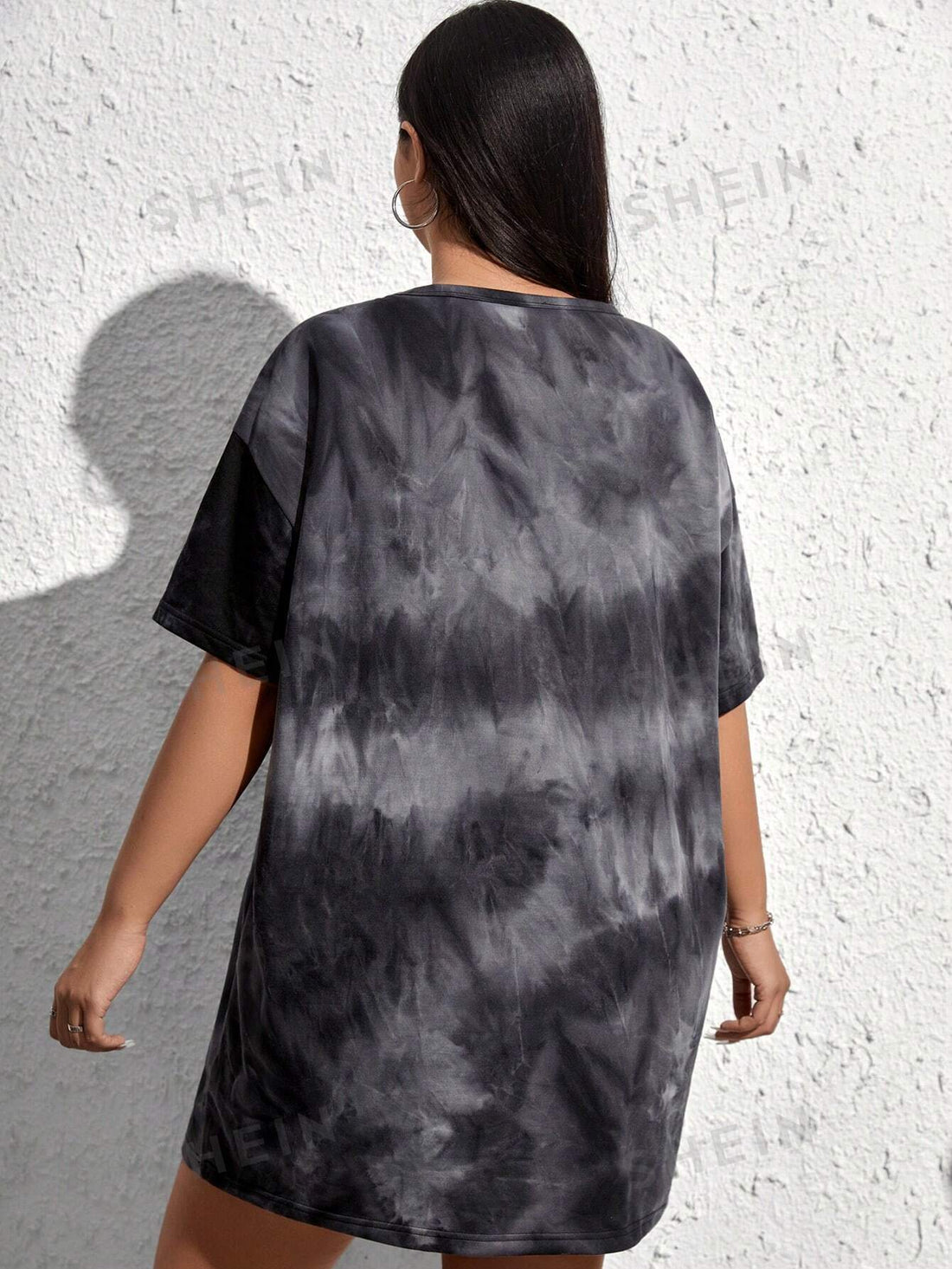 Add some magic to your wardrobe with our Sun & Moon tie-dye dress from our plus size collection. Made with high-quality fabric and expertly crafted, this dress offers both style and comfort for all body types. Stand out in unique and vibrant tie-dye patterns while embracing your curves.