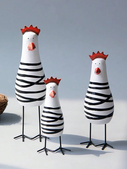 This Modernist Chicken Trio decorative craft set adds a touch of chic to any <a href="https://canaryhouze.com/collections/ornaments" target="_blank" rel="noopener">home decor</a>. Made of high-quality wood, these modern chic chickens are an eye-catching addition to your space. With their sleek design and versatile style, they are the perfect accent piece for any room.