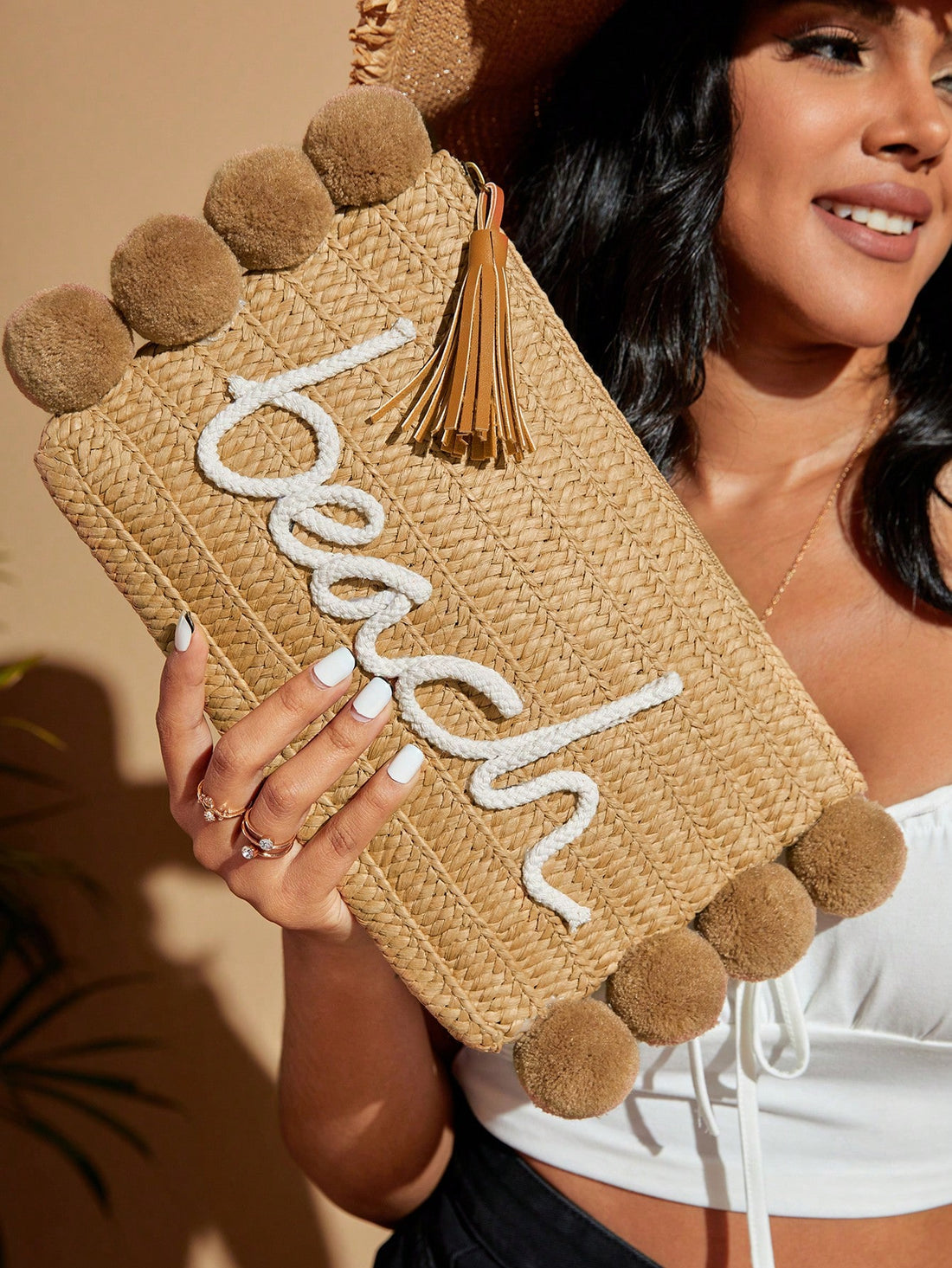 Upgrade your travel style with our Vibrant Summer Straw <a href="https://canaryhouze.com/collections/canvas-tote-bags" target="_blank" rel="noopener">Bag</a>! It features letter embroidery and playful pompom details, adding a unique touch to any outfit. This essential travel companion will hold all your essentials in one chic and colorful bag. Upgrade your summer wardrobe today!