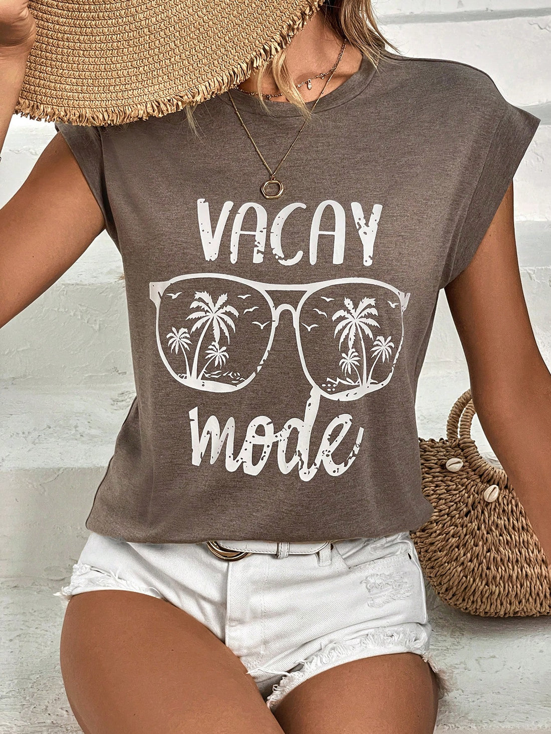 Introducing our Island Paradise Coconut Tree Letter Graphic Batwing Sleeve Tee. Made with soft and breathable fabric, this tee features a unique and eye-catching design that showcases beautiful palm trees and a bold letter graphic. Perfect for warm summer days, this tee will keep you feeling comfortable and stylish. Bring a touch of paradise to your wardrobe today.
