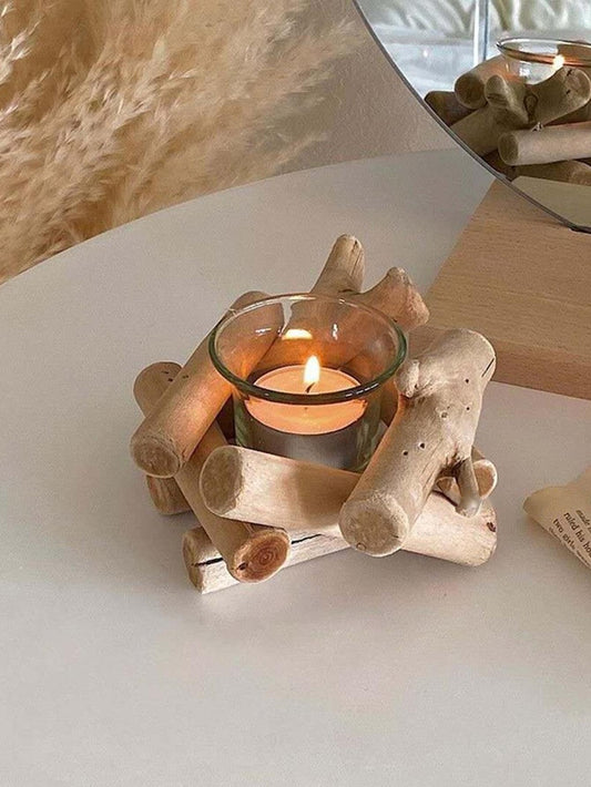 Add a touch of style to your <a href="https://canaryhouze.com/collections/candle" target="_blank" rel="noopener">home decor</a> with our Boho Wood Tree Candle Holder. Crafted from high-quality wood, this unique candle holder is sure to impress. Its intricate design and natural finish make it a perfect addition to any room. Elevate your space with our stylish candle holder.