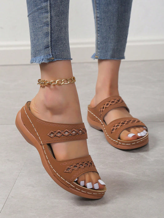 Elevate your summer footwear with these stylish wedge slide sandals. Featuring a trendy hollow out design, these elegant brown sandals are the perfect addition to any outfit. With their comfortable wedge heel, you'll enjoy both style and comfort all day long. Perfect for any fashionable woman.