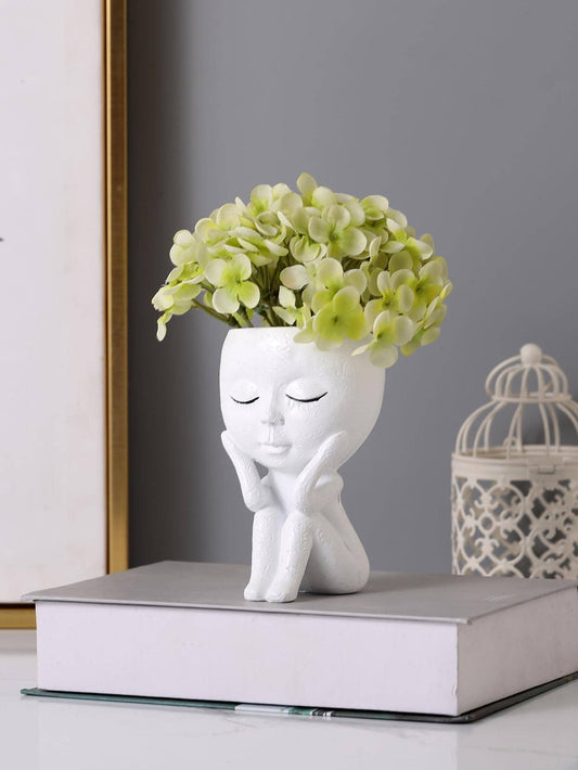 Enhance your home decor with the Nordic Figure Design Flower Pot. This unique accent piece features a beautiful and intricate design that adds a touch of elegance to any room. Crafted with high-quality materials, it is durable and long-lasting. Perfect for displaying your favorite plants and flowers.