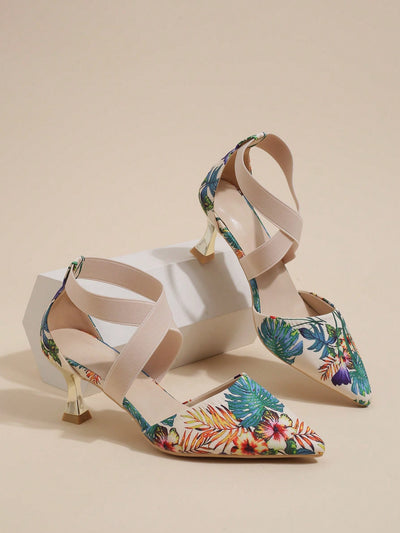 Elevate your fashion game with our Floral Pattern Ankle Strap Pumps. These elegant pumps feature a unique floral pattern and sturdy pyramid heels for added style and stability. Make a statement with every step and add a touch of sophistication to any outfit. Step up your style game with these must-have pumps.