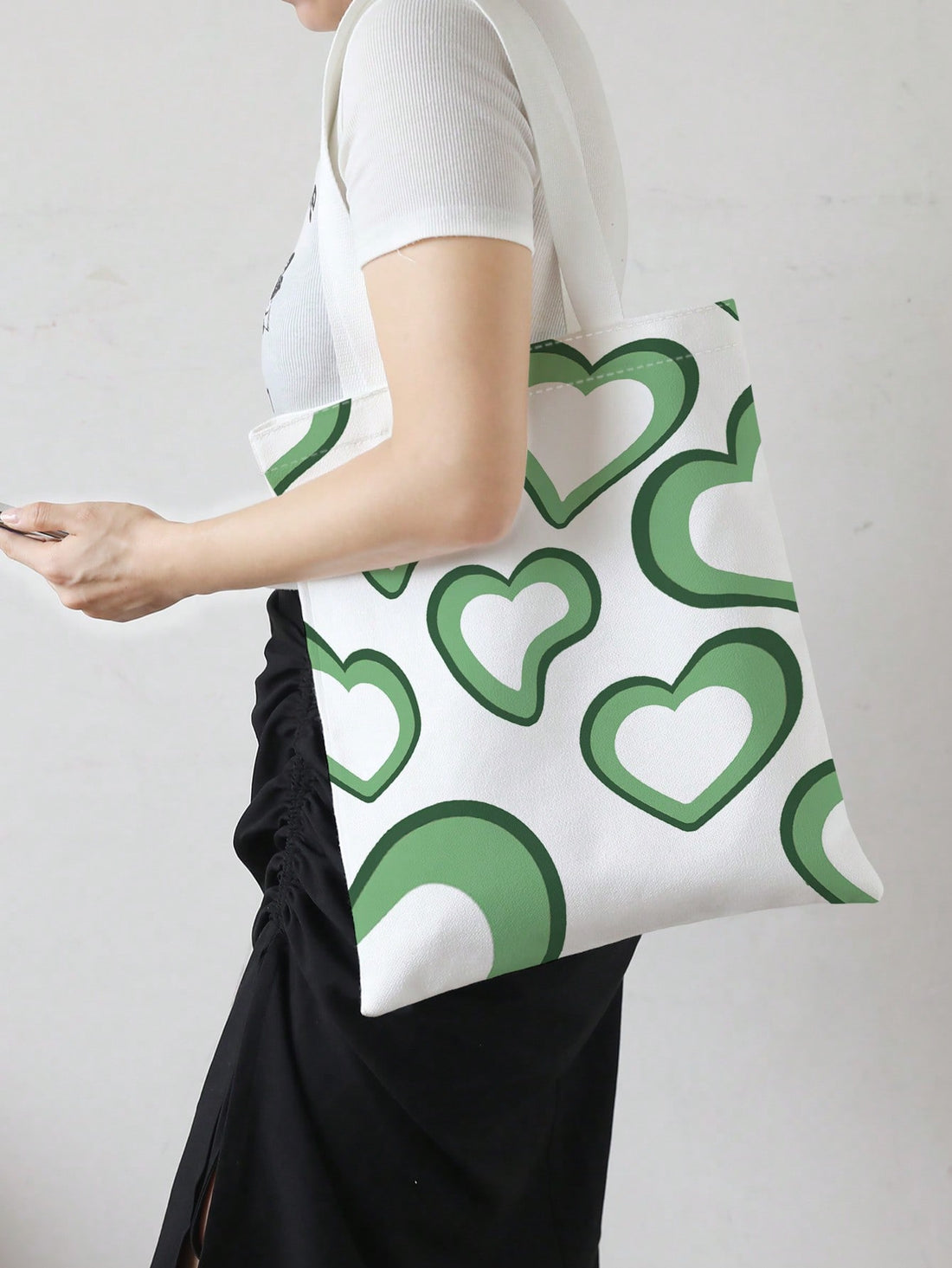 Introducing Love is in the <a href="https://canaryhouze.com/collections/canvas-tote-bags" target="_blank" rel="noopener">Bag</a>: Heart Print Shopper Tote - the perfect accessory for any romantic outing. With its heart print design and spacious interior, you'll be able to carry everything you need while spreading love and style. Made with high-quality materials for durability and comfort. Show your love with this chic tote.