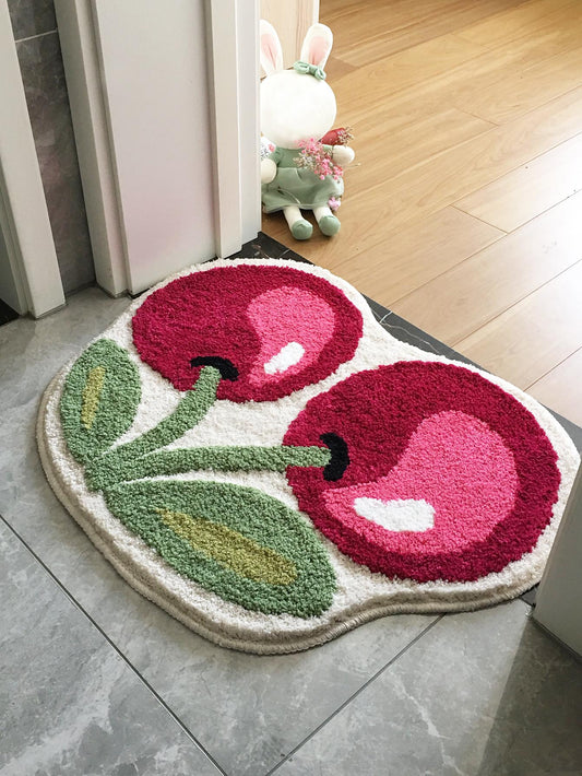 This charming cherry door mat is made with modern polyester fabric that is perfect for indoor and outdoor use. Its non-slip and absorbent design makes it ideal for any household, providing safety and cleanliness. Enjoy its beautiful cherry design while keeping your home tidy.