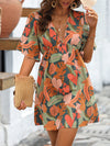 Island Escape: Tropical Print Butterfly Sleeve Dress