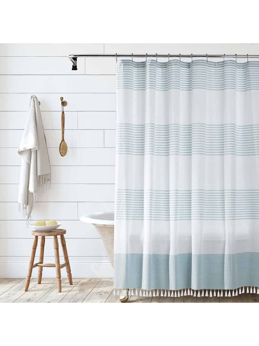 The Boho Chic Tassel <a href="https://canaryhouze.com/collections/shower-curtain" target="_blank" rel="noopener">Shower Curtain</a> is the perfect addition to any bathroom, bringing a touch of rustic charm to your space. The tassel detailing adds a whimsical and bohemian feel, while the durable fabric ensures long-lasting use. Elevate your bath experience with this stylish and functional piece.