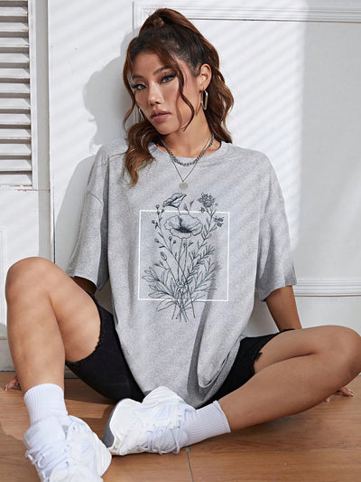 Chic Floral Print Drop Shoulder Tee - Embrace Effortless Style with This Must-Have Top
