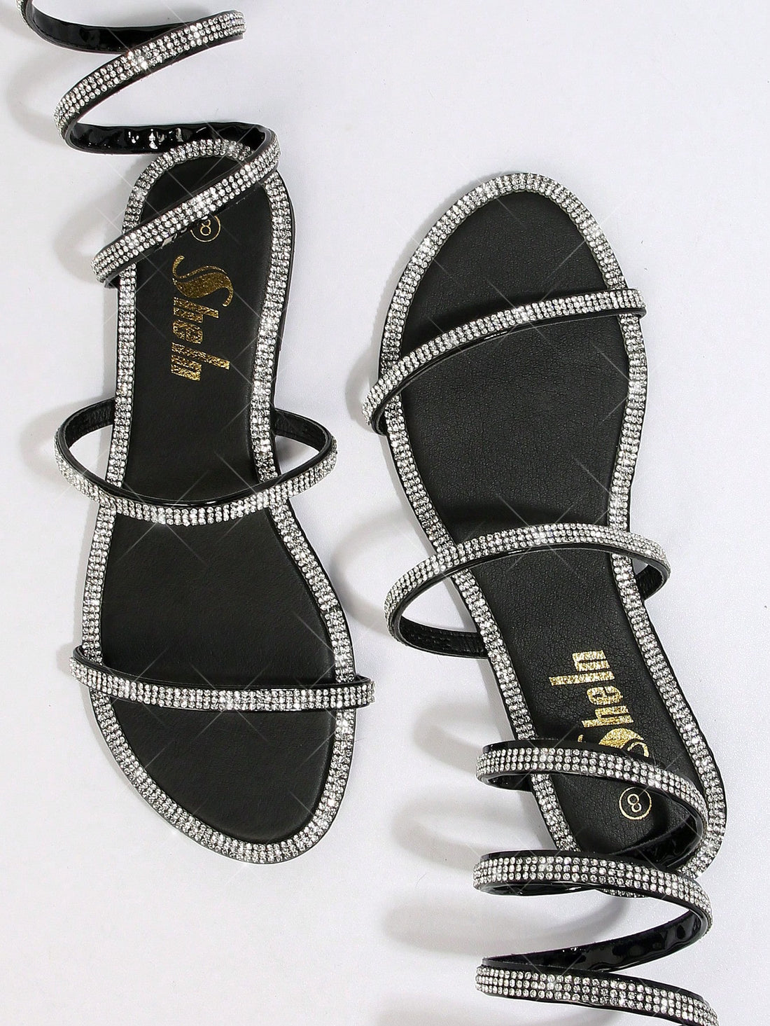 Experience chic and comfort with our Round Toe Wrap Around Flat Sandals for Women. Perfect for any occasion, these stylish sandals provide a snug fit and an elevated look. With a wrap around design, these flats offer both style and support. Elevate your style with these chic and comfortable sandals.