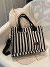 This Chic and Versatile Stripe Pattern <a href="https://canaryhouze.com/collections/canvas-tote-bags" target="_blank" rel="noopener">Tote Bag</a> is designed for women and white-collar workers. Made with a stylish stripe pattern, it is both fashionable and practical. With ample space and a durable design, this tote bag is perfect for everyday use and will elevate any outfit.