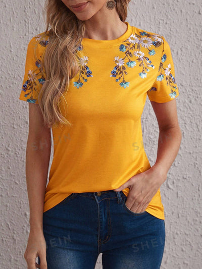 Introducing the Spring Blooms Round Neck Tee. With its vibrant floral design and comfortable round neck, this tee is the perfect addition to your spring wardrobe. Made from high-quality materials, it offers both style and comfort. Enjoy the beauty of spring with this must-have tee.