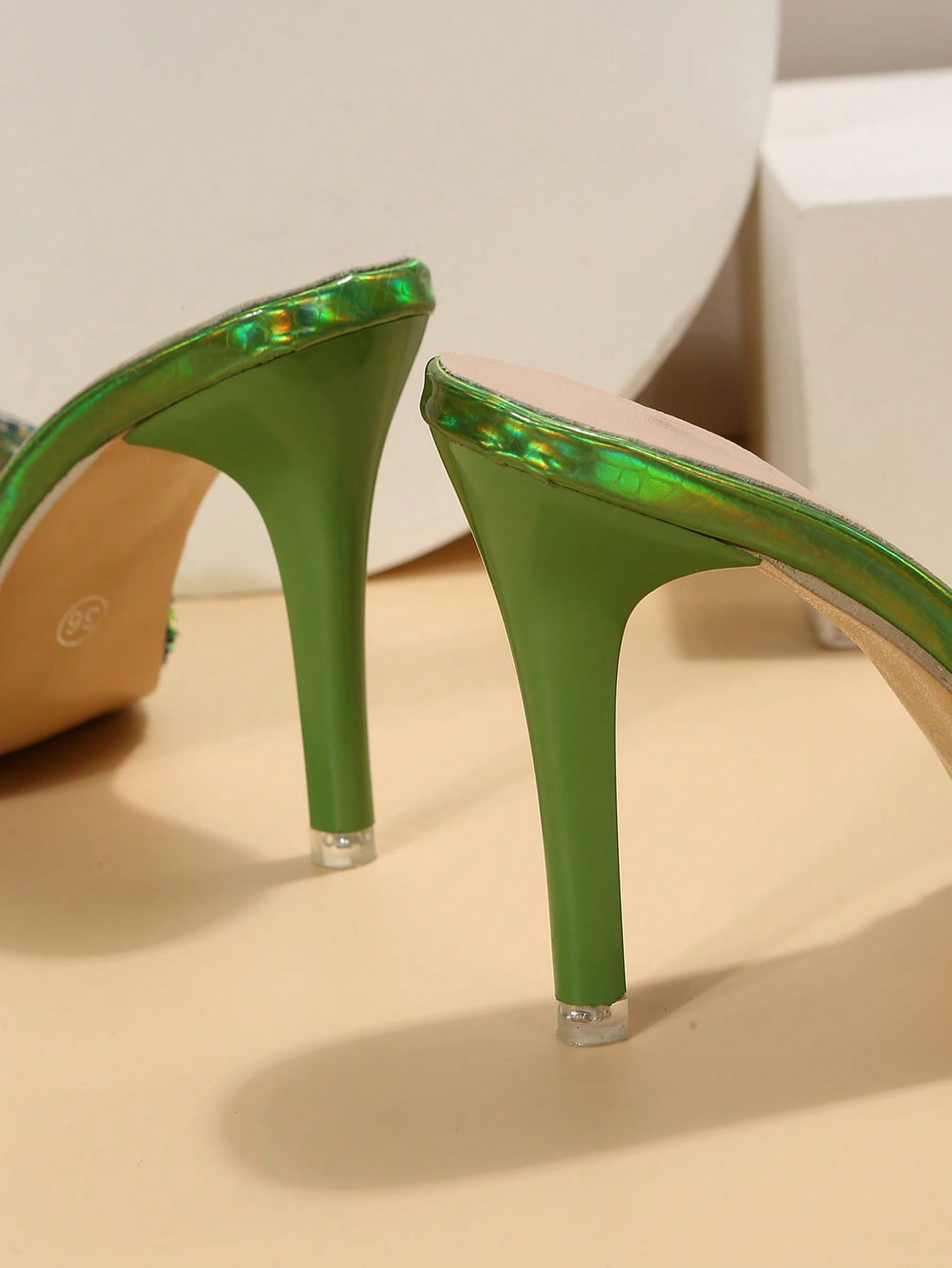 Elevate your summer style with our Glamorous Rhinestone Stiletto Mule <a href="https://canaryhouze.com/collections/women-canvas-shoes" target="_blank" rel="noopener">Sandals</a>. These sandals add a touch of glamour to any outfit, making you stand out in style. The rhinestone details and stiletto heels exude elegance, while the mule design offers comfort and convenience. Upgrade your summer wardrobe with these chic sandals.