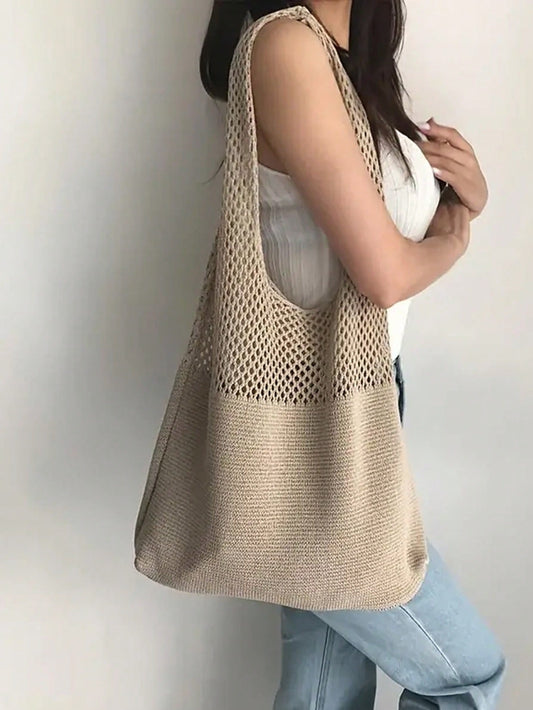This Vintage Vibe crochet shoulder <a href="https://canaryhouze.com/collections/canvas-tote-bags" target="_blank" rel="noopener">bag</a> boasts a large capacity, perfect for stylish college students and teen girls. Its unique design gives off a trendy, vintage feel that will elevate any outfit. Show off your fashion sense while staying organized with this must-have accessory.