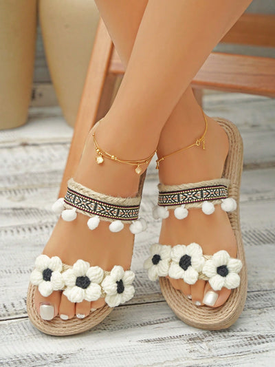 Step up your vacation style with our Beach and Beyond flat <a href="https://canaryhouze.com/collections/women-canvas-shoes" target="_blank" rel="noopener">sandals</a>. These women's sandals feature a playful flower and pompom decoration, perfect for adding a touch of fun to your beach attire. Made for both style and comfort, these sandals are a must-have for any getaway.