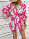 Vibrant Vacation Vibes: Allover Print Batwing Sleeve Knot Front Romper