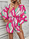 Vibrant Vacation Vibes: Allover Print Batwing Sleeve Knot Front Romper