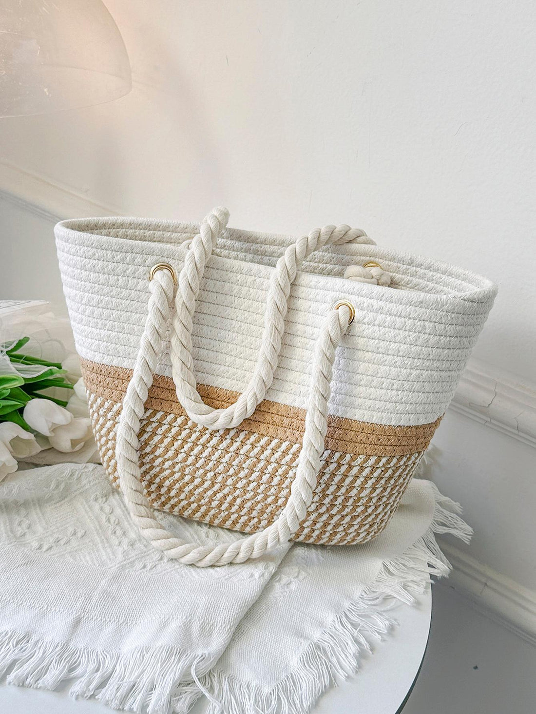 Experience luxury and convenience on your vacation with our Chic and Classic Two-Tone Straw <a href="https://canaryhouze.com/collections/canvas-tote-bags" target="_blank" rel="noopener">Bag</a>. Made with durable straw and featuring double handles, this bag will keep your belongings safe and stylish. Perfect for any occasion, from the beach to a night out.