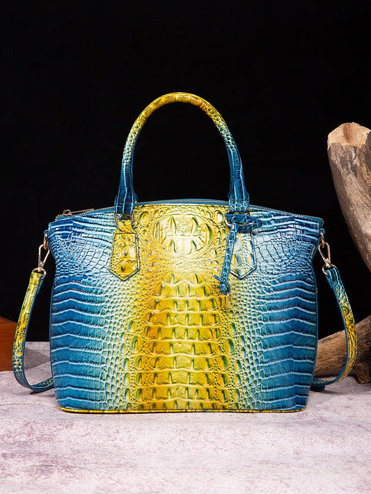 Upgrade your style with the Vintage Chic Ombre Crocodile Pattern <a href="https://canaryhouze.com/collections/canvas-tote-bags" target="_blank" rel="noopener">Handbag</a>. The intricate design exudes sophistication and luxury, perfect for any occasion. The spacious interior and ergonomic shoulder strap provide both functionality and comfort. Elevate your fashion game with this timeless accessory.