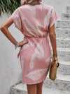 Enviable Vacation Style: Women's Plant-Printed Wrap Dress with Tie-Waist Detail