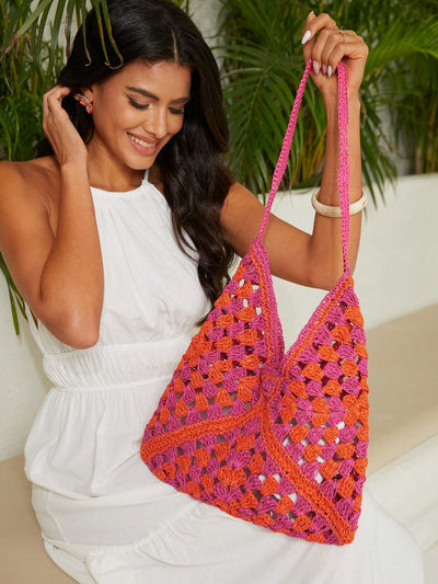 This crocheted <a href="https://canaryhouze.com/collections/canvas-tote-bags" target="_blank" rel="noopener">bag</a> is perfect for all your vacation needs! Its hollow out design adds a stylish touch while also providing a large capacity to fit all your essentials. Stay organized and fashionable on your travels with this must-have accessory.