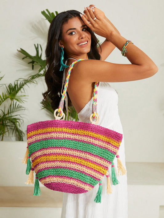 Introducing your perfect oversized vacation companion - the Vibrant Colorblock Straw <a href="https://canaryhouze.com/collections/canvas-tote-bags" target="_blank" rel="noopener">Bag</a>! With its bold and colorful design, this bag adds a touch of style to your summer wardrobe. Crafted from durable straw, it's the ideal size for all your beach essentials. Make a statement on your next vacation with this must-have accessory!