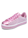 These Sparkling Floral Dressy Sneakers feature a shimmery rhinestone design perfect for wedding or glamorous occasions. The floral pattern is adorned with iridescent crystals for added glamour and shine. Make a statement with these beautiful dressy sneakers.