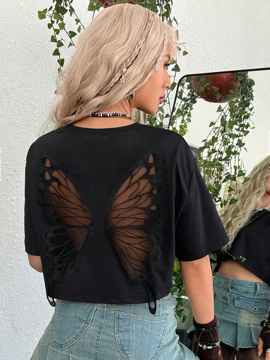 Elevate your style with our Butterfly Mesh Insert Drop Shoulder Tee. Made with a unique mesh design, this tee adds a touch of sophistication to your wardrobe. Experience comfort and style in one with our drop shoulder design. Perfect for any occasion.