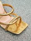 Glamorous Gold Heeled Sandals: Metallic Lizard Embossed Twist-Strap Mule Sandals for Women