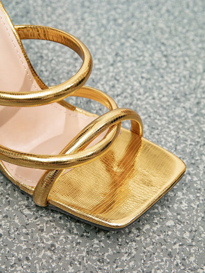 Glamorous Gold Heeled Sandals: Metallic Lizard Embossed Twist-Strap Mule Sandals for Women