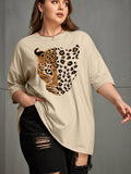 This Savage Style plus-size tee offers a fierce yet comfortable option for bold fashion lovers. The drop shoulder design and leopard print add a touch of edgy style to any outfit. Made with high-quality materials, this tee ensures both comfort and durability for all-day wear.