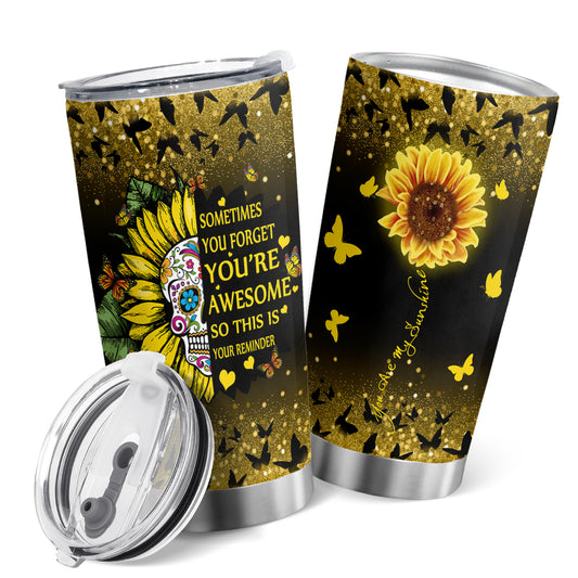 This 20oz stainless steel tumbler is designed for the coffee, tea, and water drinkers, with a delightful sunflower and "You Are My Sunshine" design. The insulated double-wall vacuum keeps your drinks hot or cold for hours and fits most cup holders. Perfect for the home, office, car, and outdoors!