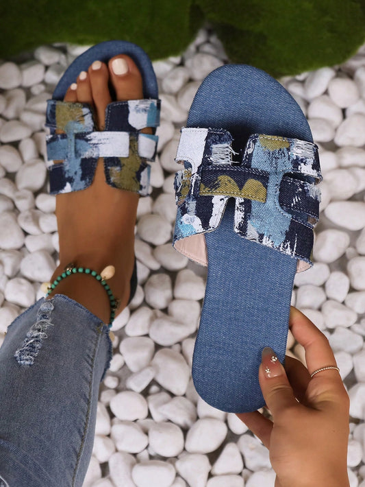 Elevate your summer style with our Summer Fun slide <a href="https://canaryhouze.com/collections/women-canvas-shoes" target="_blank" rel="noopener">sandals</a>. The graphic print and buckle decor add a trendy touch to these comfortable sandals. Perfect for any fashionable woman looking for a stylish and practical shoe option. Choose from a variety of designs.