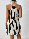 Sun-Kissed Style: Spring Break Graphic Print Halter Neck Dress