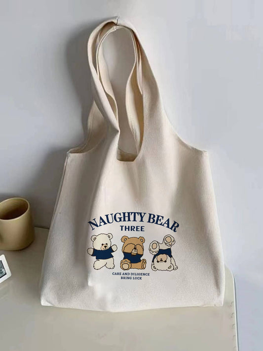 Elevate your style with our Cute and Stylish Cartoon Bear Printed Canvas Tote Bag. Designed for the fashionable and fun on-the-go, this durable bag features a charming cartoon bear print that will surely turn heads. Stay stylish and organized with this perfect companion for any outing.