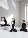 Enhance your home with our set of 3 black yoga figurines. These stylish <a href="https://canaryhouze.com/collections/ornaments" target="_blank" rel="noopener">decor</a> pieces add a touch of serenity and tranquility to any room. Perfect for yoga enthusiasts or those seeking a calming atmosphere. Made with high-quality materials and intricate designs, they are the perfect props for your yoga practice or as a unique addition to your decor.