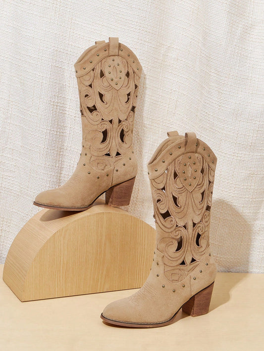 Expertly crafted with a studded western design, these faux suede <a href="https://canaryhouze.com/collections/women-boots" target="_blank" rel="noopener">boots</a> offer a stylish yet comfortable chunky heel. The perfect addition to any outfit, their durable construction promises long-lasting wear. Elevate your look with these on-trend boots.