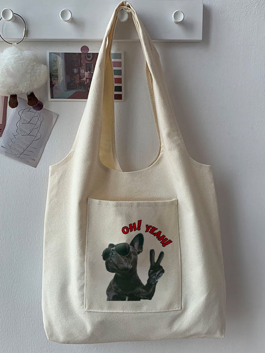 Expertly designed for dog lovers, this versatile and minimalist canvas tote bag is the perfect way to show off your love for dogs while carrying your essentials. Made with durable materials and a trendy dog print, this tote bag is both stylish and functional. A must-have for any dog lover on the go.