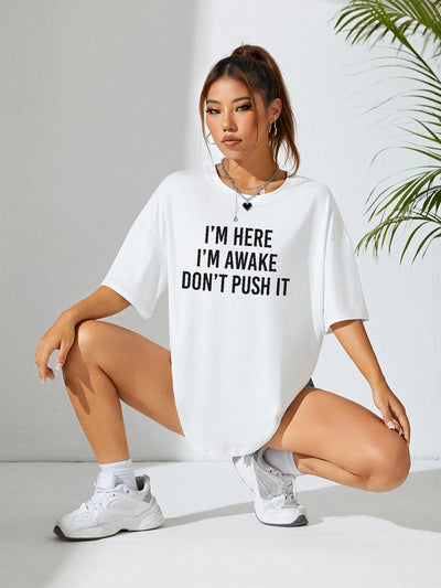 Be Bold and Express Yourself with our Slogan Graphic Drop Shoulder Tee