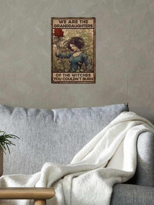 Celebrate the power and resilience of your female ancestors with this <a href="https://canaryhouze.com/collections/metal-arts" target="_blank" rel="noopener">vintage</a> plaque. Featuring the phrase "We Are The Granddaughters of The Witches You Couldn't Burn," this decorative wall art serves as a reminder of the strength and legacy passed down through generations. Perfect for displaying in your home or gifting to family, friends, and