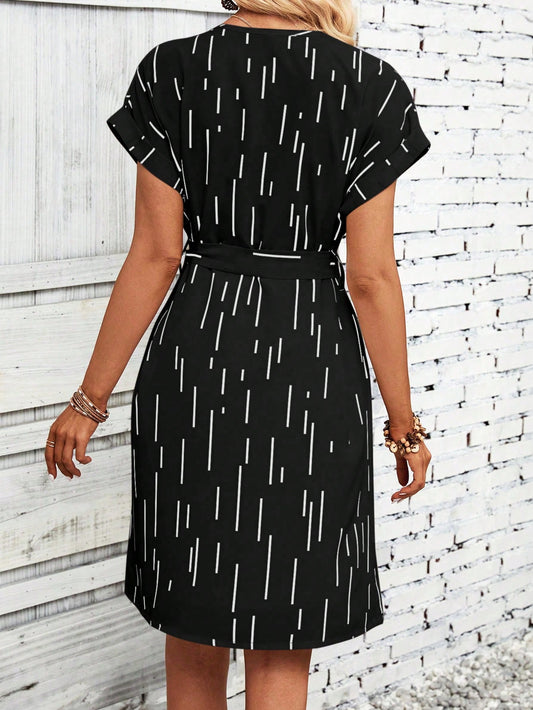 Bold and Beautiful: Geo Print Notched Neckline Batwing Sleeve Belted Dress