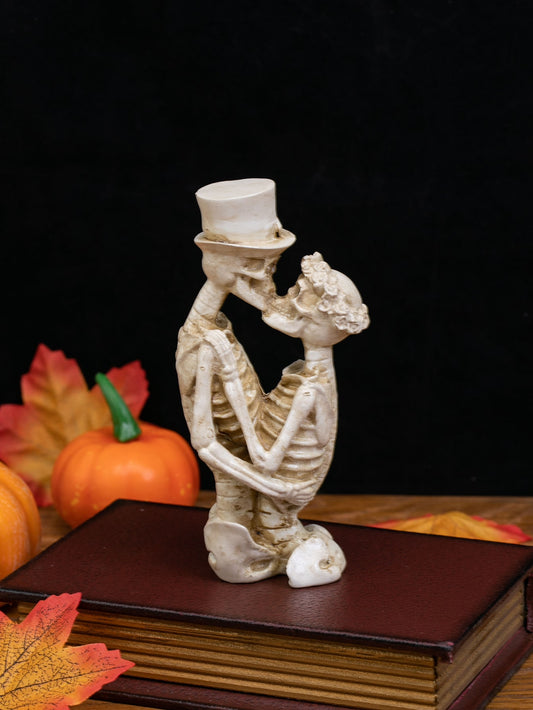 As a product inspired by both love and the macabre, Spooky Love: Skull Couple Decorative <a href="https://canaryhouze.com/collections/ornaments" target="_blank" rel="noopener">Ornament</a> brings a unique touch to any space. With its intricate details and design, this ornament serves as a stunning conversation piece. Create an eerie yet romantic ambiance with this one-of-a-kind decoration.