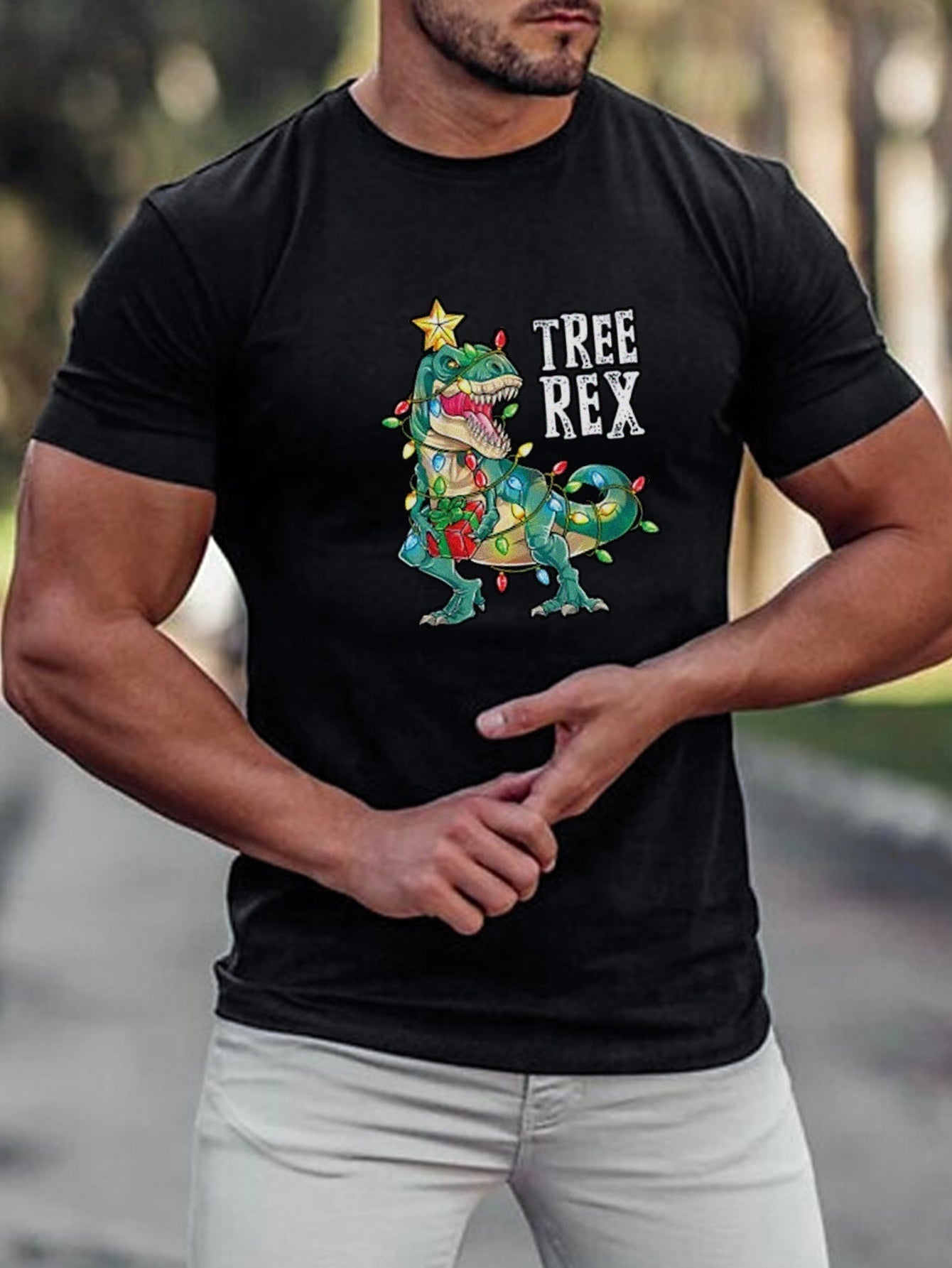 Unleash your inner dino with our Dino-mite Christmas T-Shirt! Featuring an oversized anime dinosaur graphic print, this shirt is perfect for adding a fun touch to your festive workouts and outdoor adventures. Stay comfortable and stylish while showing off your love for dinosaurs. Available for men of all sizes.