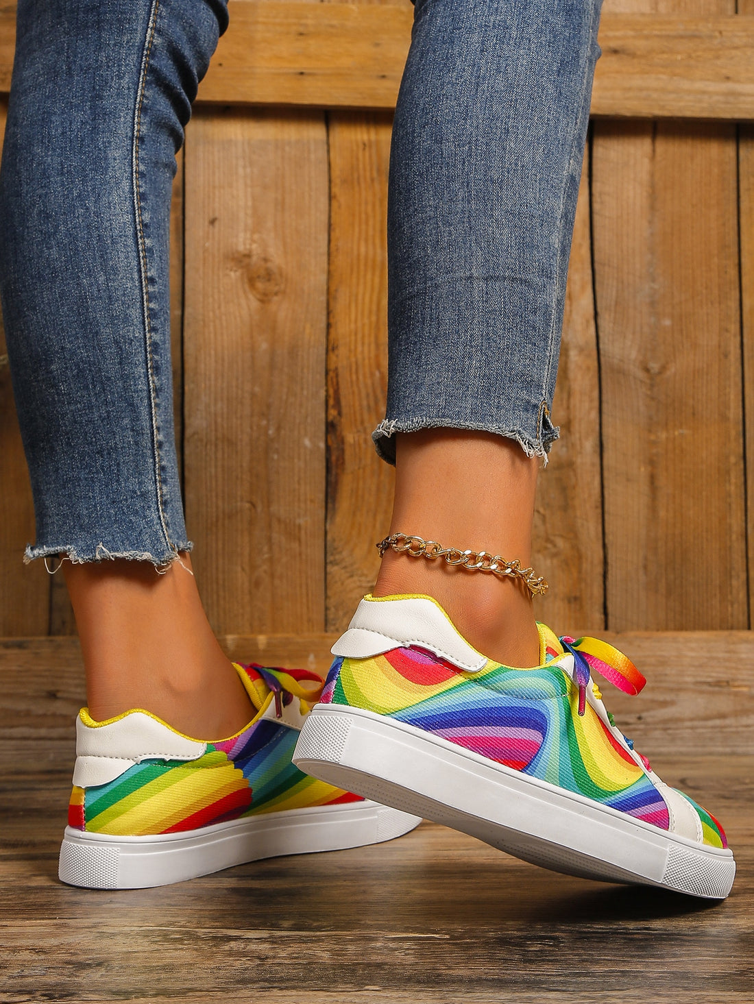 Experience comfort in style with Colorful Comfort Women's Rainbow Printed Flat Casual Sneakers. These sneakers feature a rainbow printed design with a flat, lightweight sole that offers great cushioning and flexibility for all-day wear. Enjoy a durable fit and lasting quality.