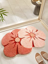 Transform your bathroom into a cozy and charming space with our Double Flower Cartoon Design Pink Bathroom Floor <a href="https://canaryhouze.com/collections/rugs-and-mats" target="_blank" rel="noopener">Mat</a>. Made of soft, absorbent material, it adds a touch of comfort and warmth to your feet. Easy to clean, it's a perfect addition to any bathroom for a clean and stylish look.