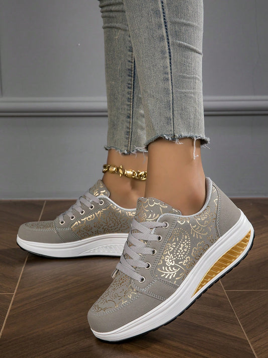 Enhance your style and comfort with our Golden Pattern Lace-Up Non-Slip Wedge Platform <a href="https://canaryhouze.com/collections/women-canvas-shoes" target="_blank" rel="noopener">Sneakers</a>. The stunning golden pattern adds a touch of elegance while the lace-up design ensures a perfect fit. The non-slip sole and wedge platform provide stability and support for all-day wear. Elevate your shoe game with these stylish and comfortable sneakers.